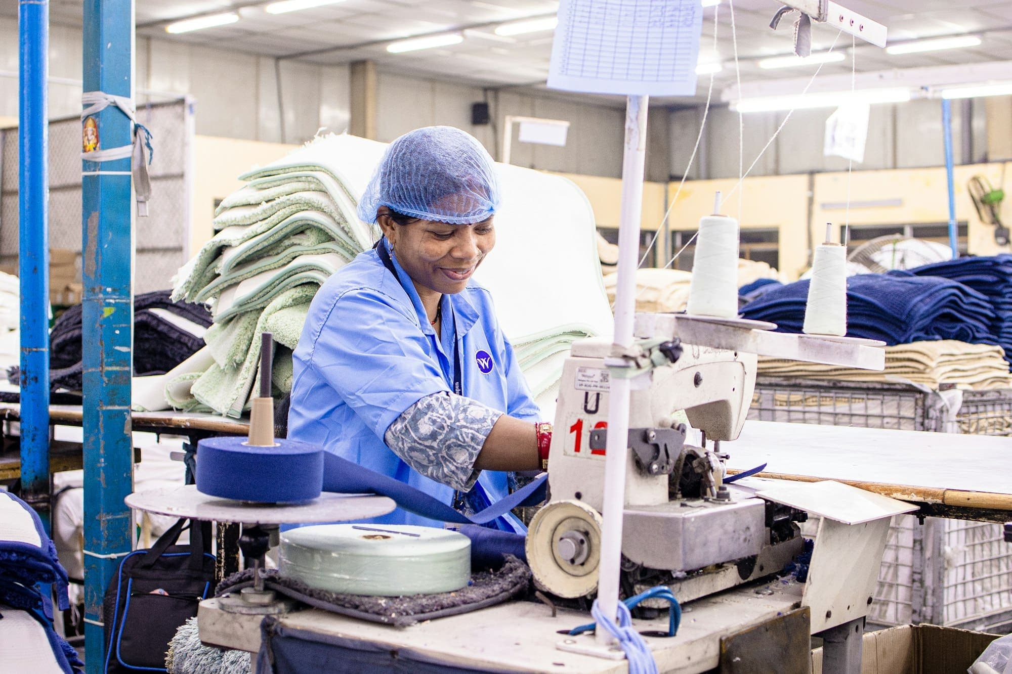 Sewing machine operator on the assembly floor
